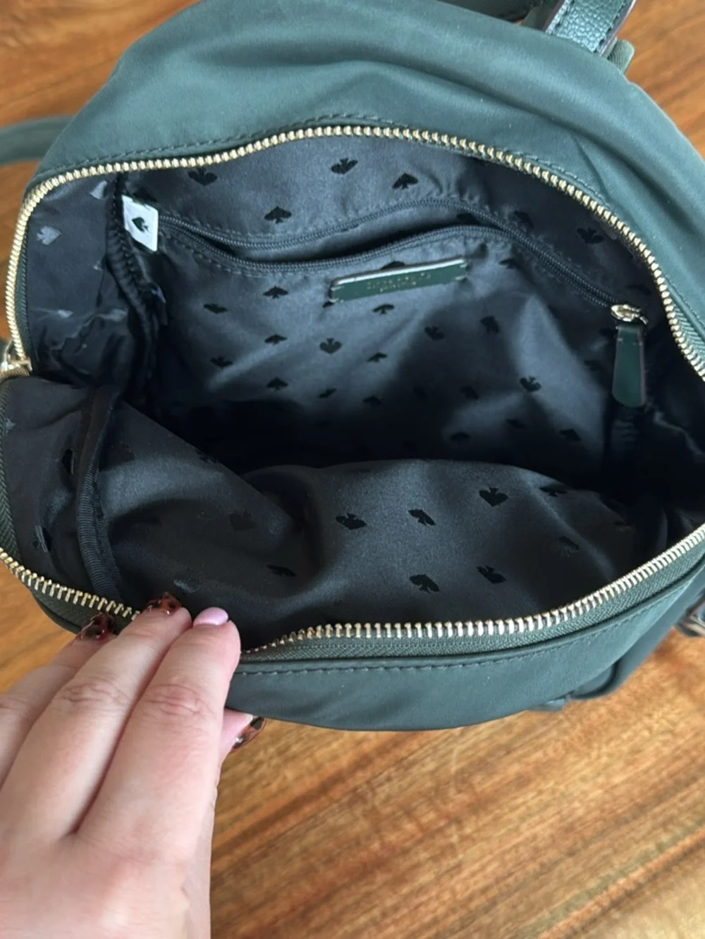 kate spade black nylon backpack with gold hardware